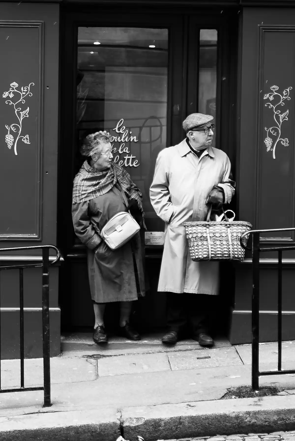 An Elderly Couple waiting in Paris