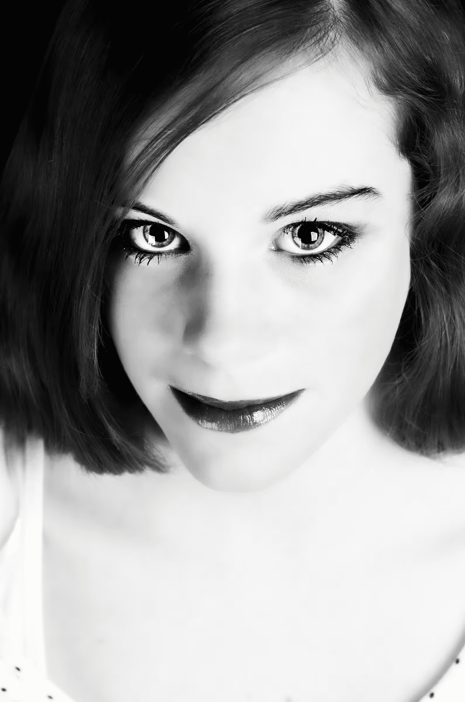Intense Gaze: Portrait Study Intense Gaze Portrait Study in a quiet portrait in monochrome.